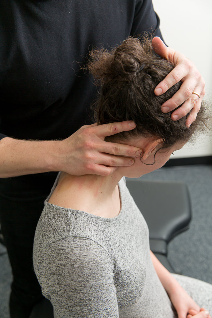 Soft tissue therapy on neck muscles
